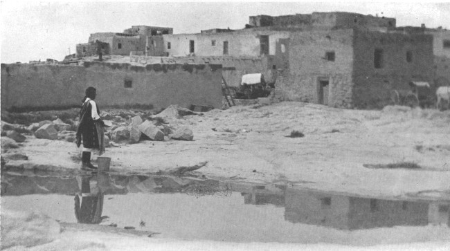 At the water hole on the outskirts of Laguna, one of the
pueblos in New Mexico