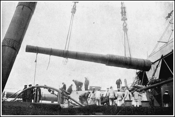 12-INCH GUN BEING LOWERED