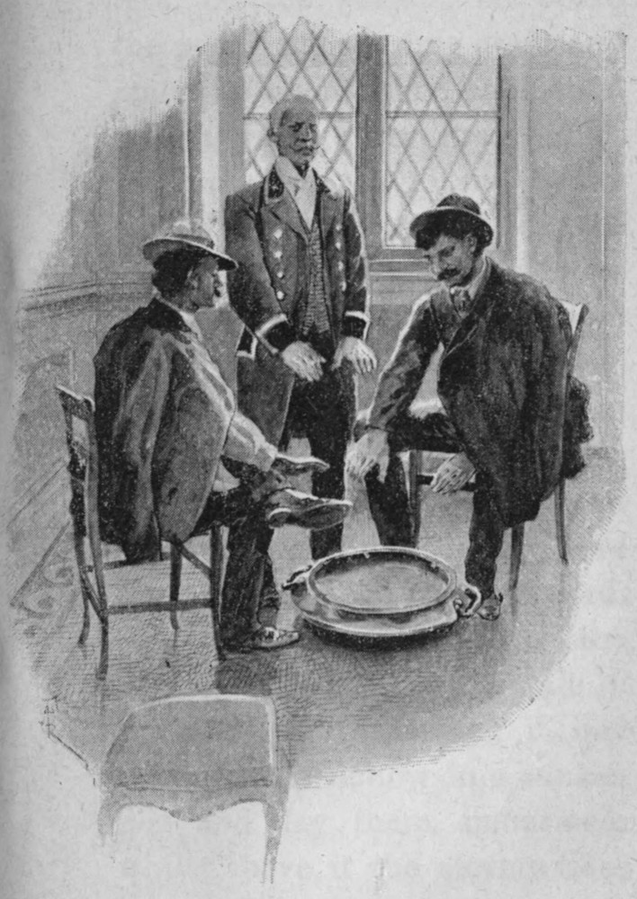 Three men appearing to warm their hands around a large cauldron on the floor